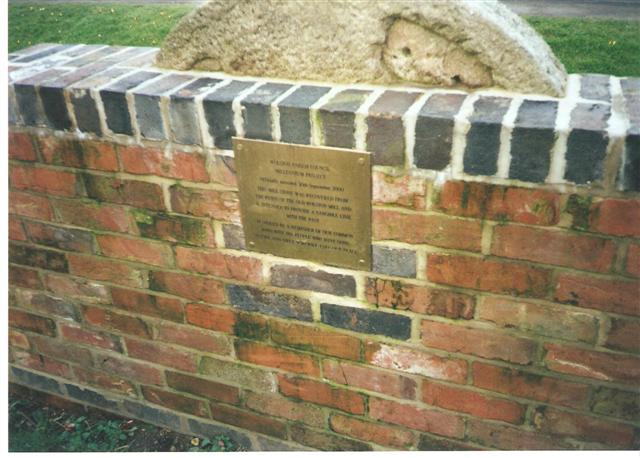On the rear of the Mill Stone is a brass plaque